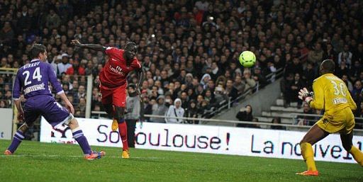 Paris Saint-Germain's defender Mamadou Sakho (C) scores a goal on February 1, 2013 at the Stade Municipal in Toulouse